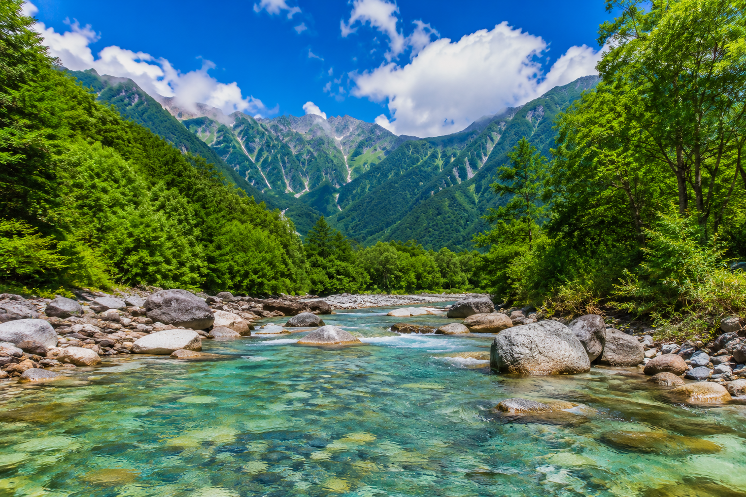 Summer mountains and a clear mountain stream